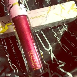 MAC “Make Me Metcurial” Lipglass